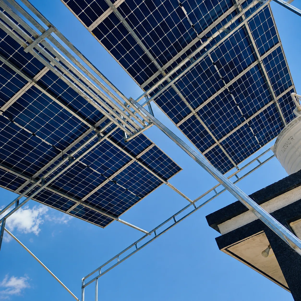 Galvanized support structure beneath an elevated solar array